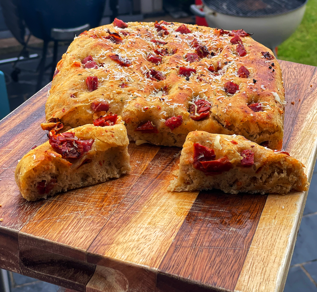 Garlic & Herb Focaccia topped with parmesan, salami milano & sundried tomatoes 🍅
