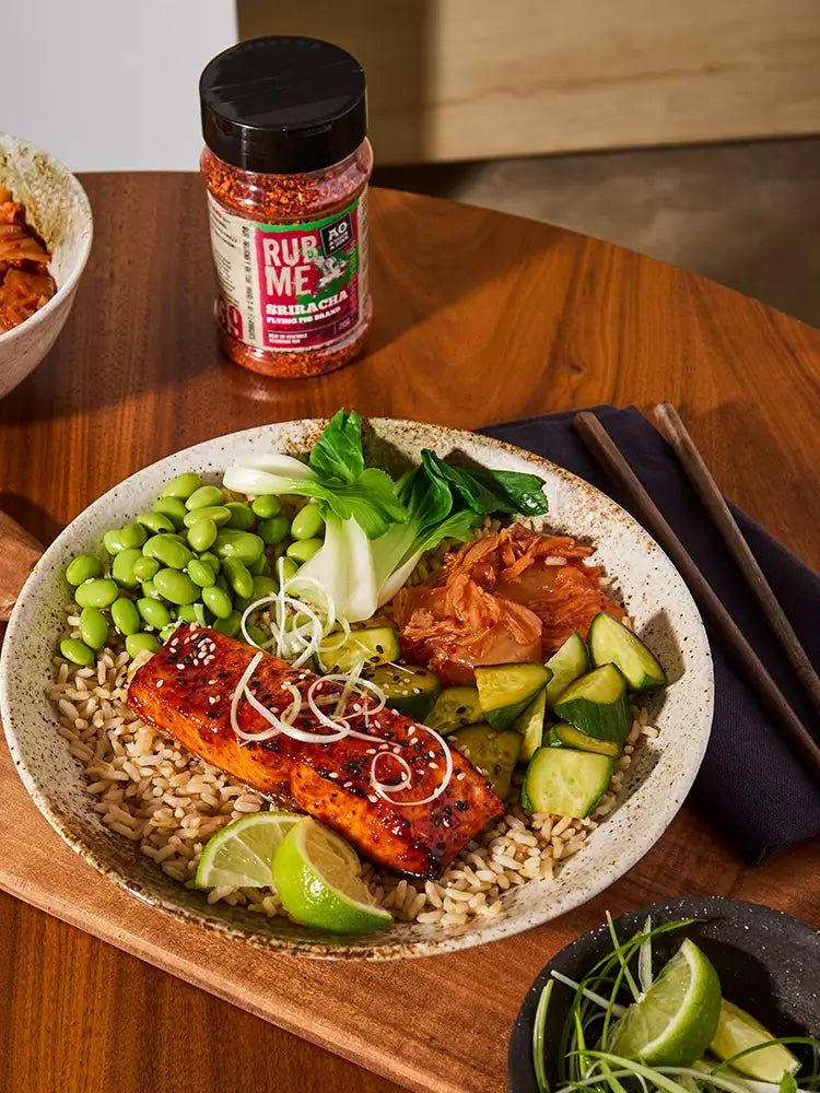 Charred Salmon in a bowl with rice and asian greens