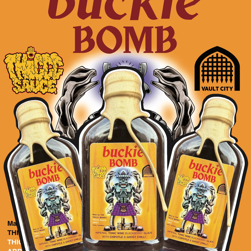 Three bottles of 'buckie BOMB' with a colorful label on an orange background, featuring the Vault City logo.