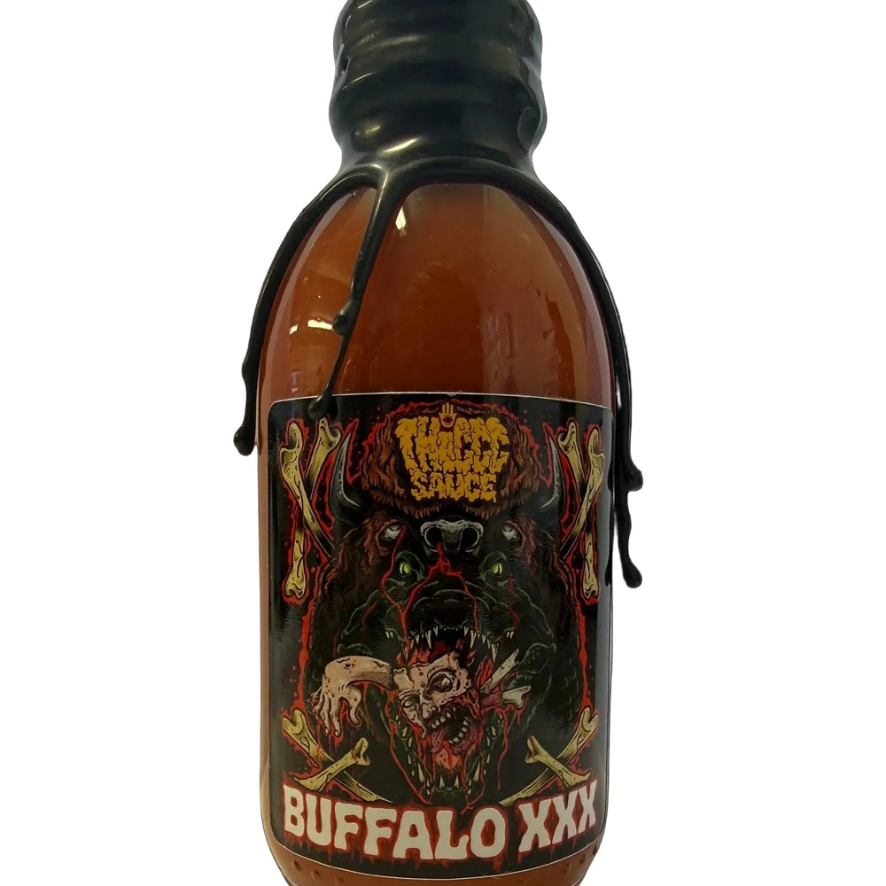 A bottle of Buffalo XXX hot sauce with a black cap and black wax-dripped edges, featuring a graphic label with a buffalo and the text 'Buffalo XXX' and 'Third Sauce'.