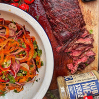 steak seasoned with angus & oink Texas steak seasoning with slaw and cherry tomatoes and a thermapen